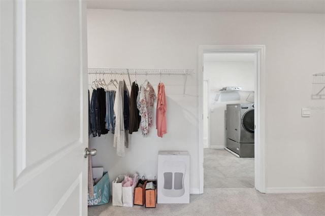 spacious closet with carpet flooring