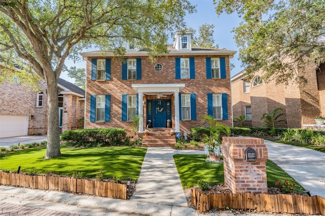 2704 Chambray Ln, Tampa, FL 33611 - colonial inspired home featuring brick siding
