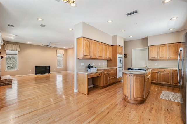 2704 Chambray Ln, Tampa, FL 33611 - kitchen with a ceiling fan, plenty of natural light, light countertops, and recessed lighting