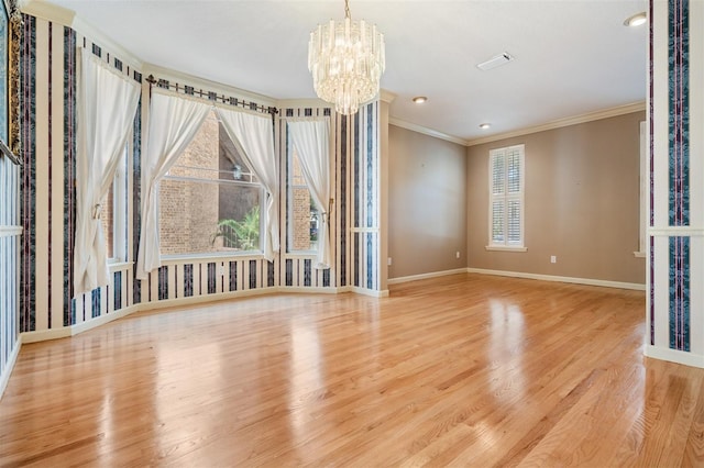 2704 Chambray Ln, Tampa, FL 33611 - empty room featuring a chandelier, ornamental molding, wood finished floors, baseboards, and recessed lighting