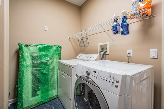 2704 Chambray Ln, Tampa, FL 33611 - clothes washing area with independent washer and dryer