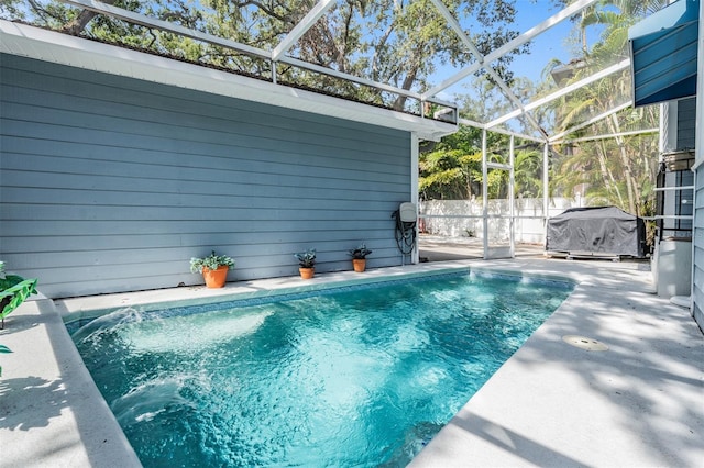 2704 Chambray Ln, Tampa, FL 33611 - view of swimming pool with a patio and a lanai