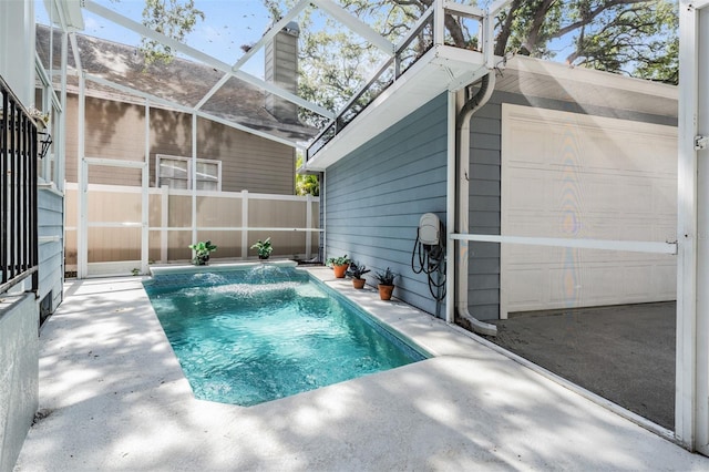 2704 Chambray Ln, Tampa, FL 33611 - view of pool featuring a fenced backyard, a patio, and a lanai