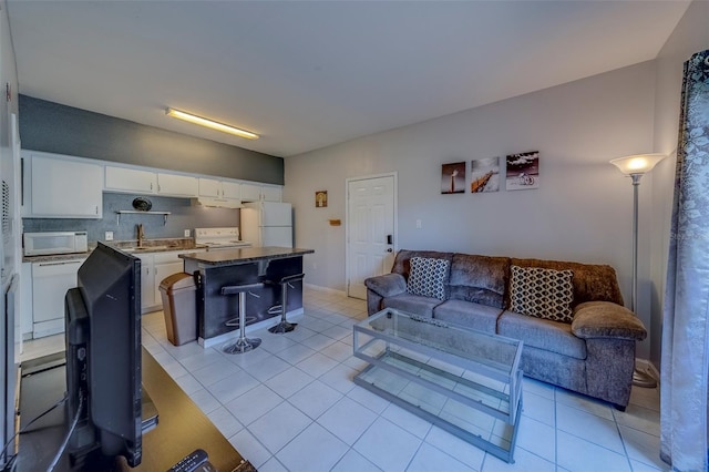 living room featuring light tile patterned floors
