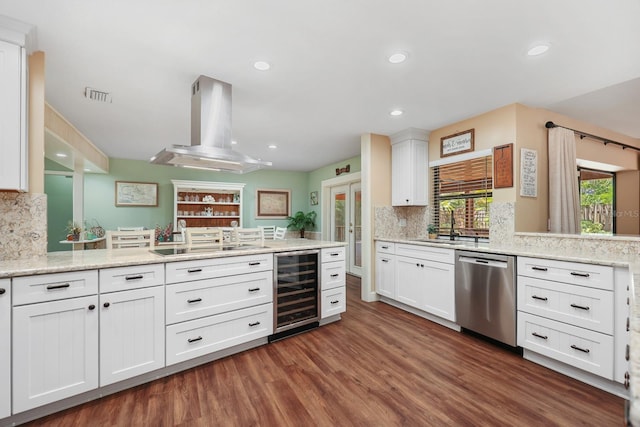 1004 Hollyberry Ct, Brandon, FL 33511 - kitchen featuring stainless steel dishwasher, a peninsula, beverage cooler, island range hood, and recessed lighting