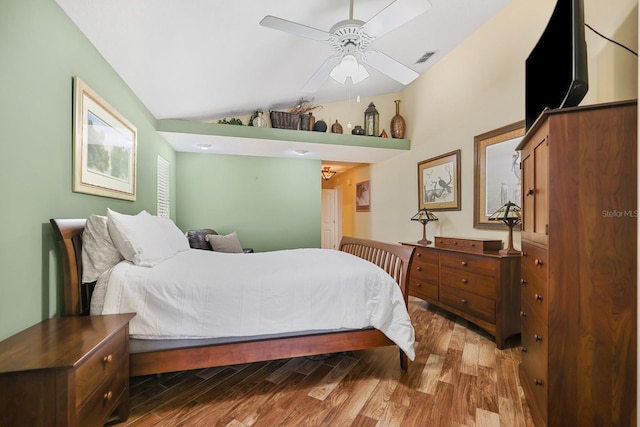 1004 Hollyberry Ct, Brandon, FL 33511 - bedroom with wood finished floors and vaulted ceiling