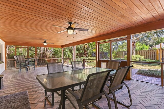 1004 Hollyberry Ct, Brandon, FL 33511 - sunroom / solarium with outdoor dining space, wood ceiling, and a ceiling fan
