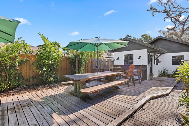 1004 Hollyberry Ct, Brandon, FL 33511 - wooden deck featuring outdoor dining space