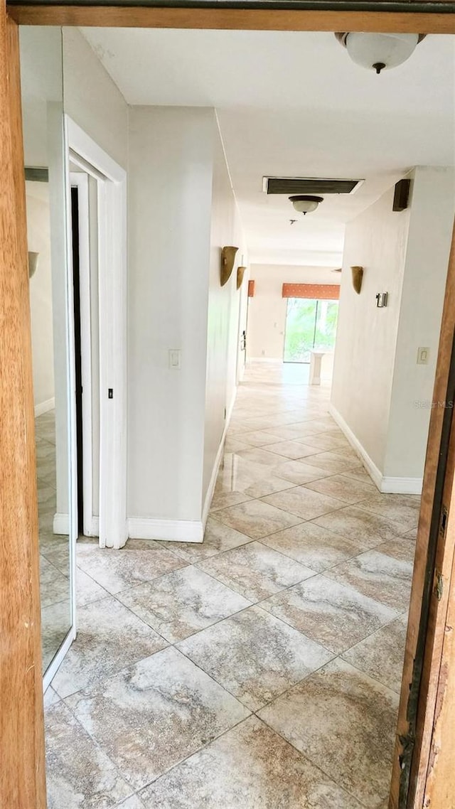 17115 Bay St, Jupiter, FL 33477 - hallway with baseboards