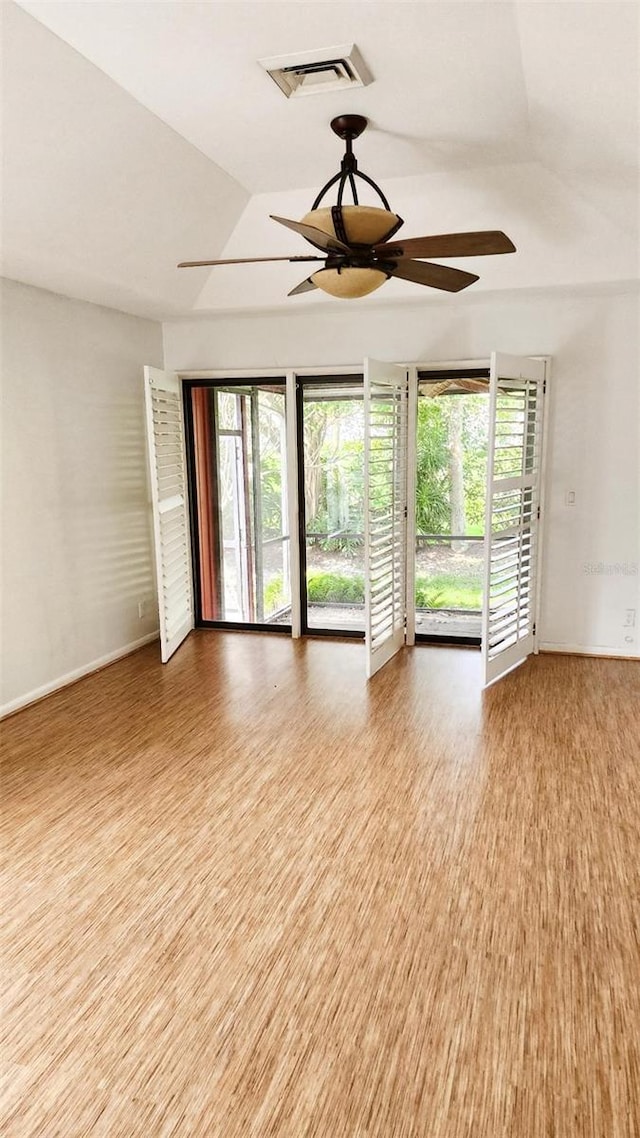 17115 Bay St, Jupiter, FL 33477 - empty room with baseboards, a ceiling fan, visible vents, and a wealth of natural light