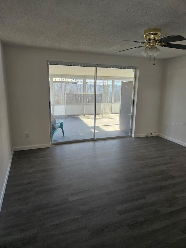 6241 Westport Dr, Port Richey, FL 34668 - empty room with dark wood finished floors, a healthy amount of sunlight, and baseboards