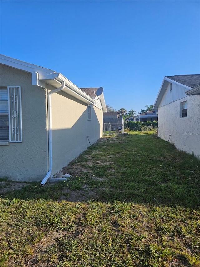 6241 Westport Dr, Port Richey, FL 34668 - view of yard featuring fence