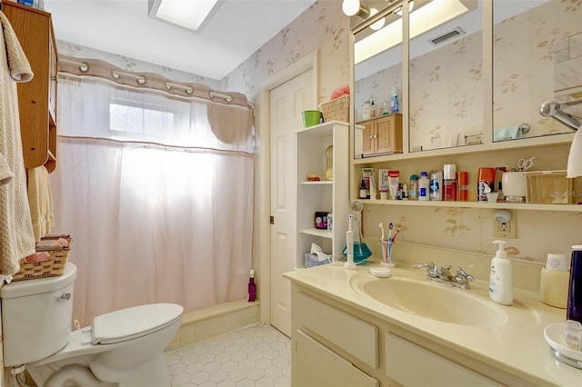 bathroom with curtained shower, tile patterned floors, visible vents, toilet, and vanity