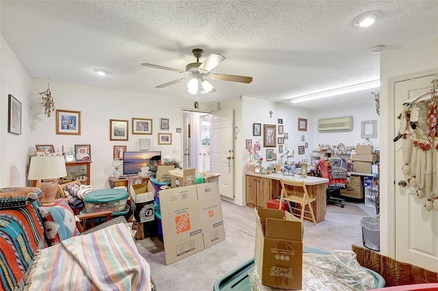 interior space featuring light colored carpet, ceiling fan, a textured ceiling, and a wall mounted AC