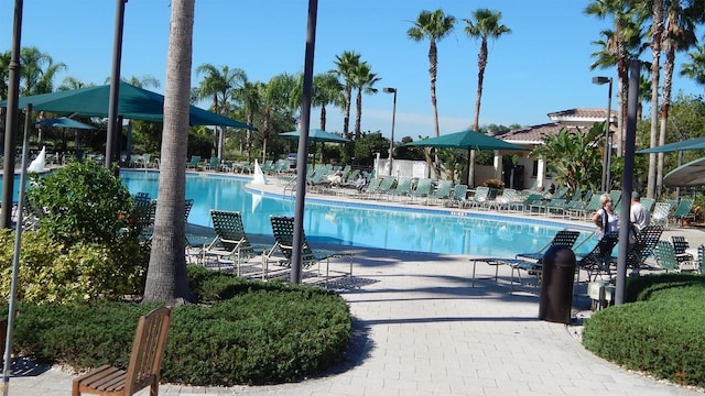 pool with a patio