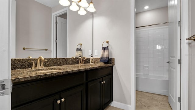 11720 Navajo Sandstone St, Riverview, FL 33579 - full bathroom featuring a sink, baseboards, tile patterned flooring, and double vanity