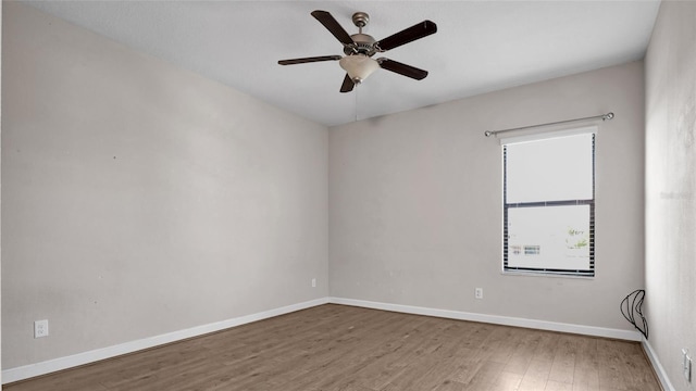 11720 Navajo Sandstone St, Riverview, FL 33579 - spare room with a ceiling fan, baseboards, and wood finished floors