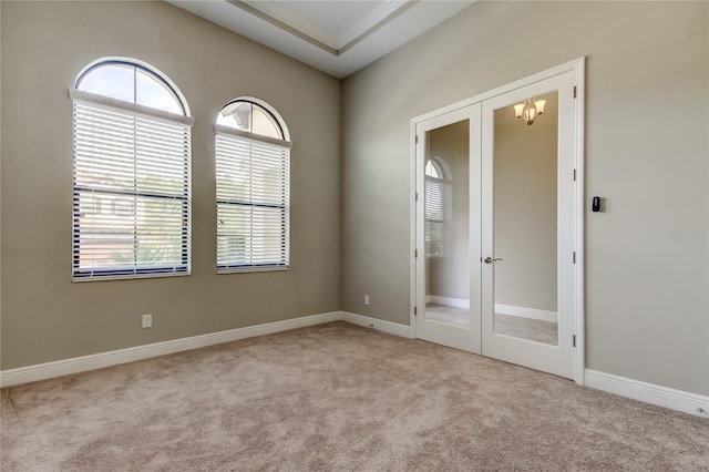 4975 Night Star Trl, Odessa, FL 33556 - carpeted spare room with french doors and baseboards