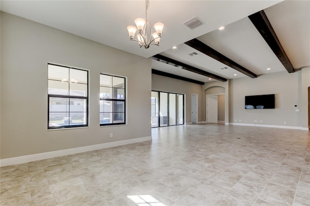 4975 Night Star Trl, Odessa, FL 33556 - unfurnished living room featuring a chandelier, arched walkways, beamed ceiling, and baseboards
