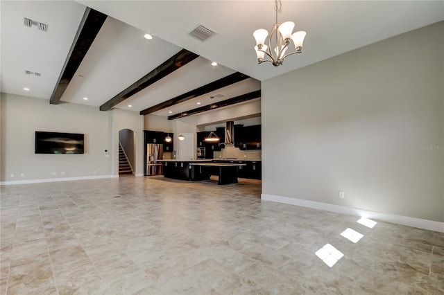 4975 Night Star Trl, Odessa, FL 33556 - unfurnished living room with arched walkways, a chandelier, beam ceiling, recessed lighting, and baseboards