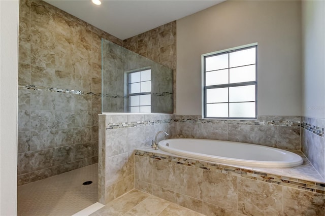 4975 Night Star Trl, Odessa, FL 33556 - full bath featuring a bath and walk in shower