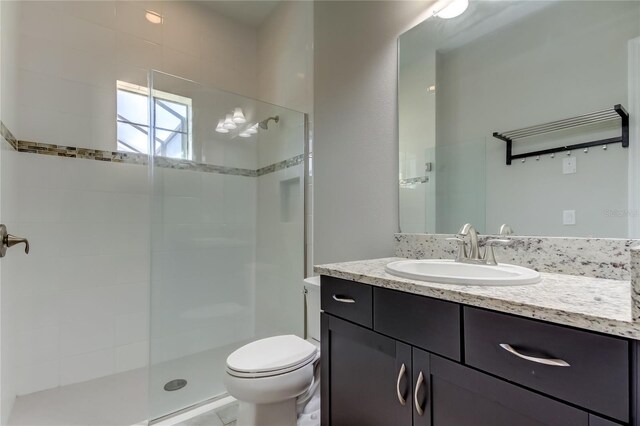 4975 Night Star Trl, Odessa, FL 33556 - bathroom with a stall shower, toilet, and vanity