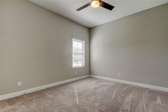 4975 Night Star Trl, Odessa, FL 33556 - spare room featuring ceiling fan, light carpet, and baseboards
