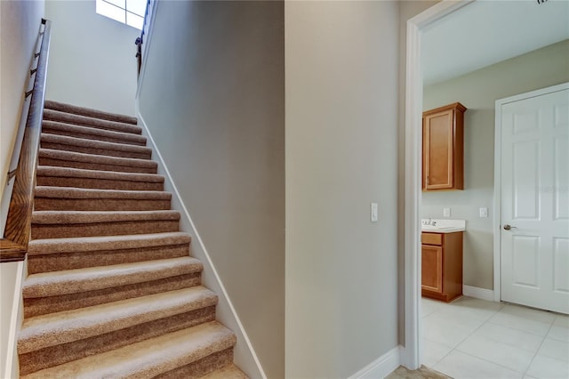 4975 Night Star Trl, Odessa, FL 33556 - stairs featuring tile patterned floors and baseboards