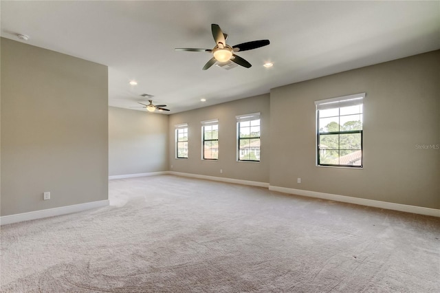 4975 Night Star Trl, Odessa, FL 33556 - empty room featuring ceiling fan, baseboards, light carpet, and recessed lighting