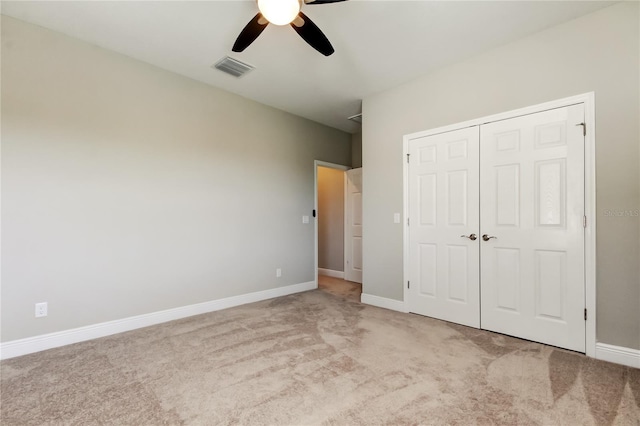 4975 Night Star Trl, Odessa, FL 33556 - unfurnished bedroom with carpet floors, a closet, baseboards, and ceiling fan