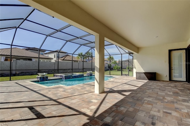 4975 Night Star Trl, Odessa, FL 33556 - view of pool featuring a patio area, a lanai, a pool with connected hot tub, and a fenced backyard