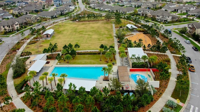 4975 Night Star Trl, Odessa, FL 33556 - aerial overview of property's location featuring a pool area and nearby suburban area