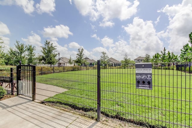 4975 Night Star Trl, Odessa, FL 33556 - gate featuring a residential view