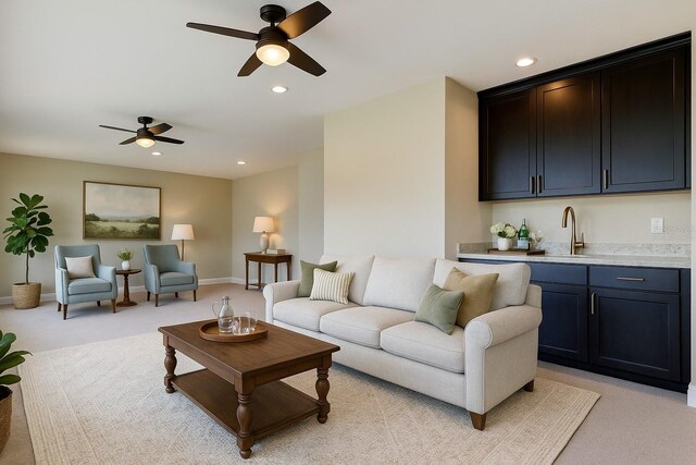 4975 Night Star Trl, Odessa, FL 33556 - living area with ceiling fan, light carpet, wet bar, recessed lighting, and baseboards