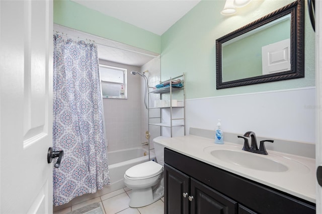 bathroom with shower / tub combo, tile patterned floors, vanity, and toilet