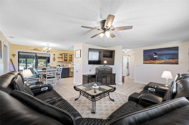 living room with ceiling fan with notable chandelier, visible vents, a textured ceiling, and light tile patterned floors