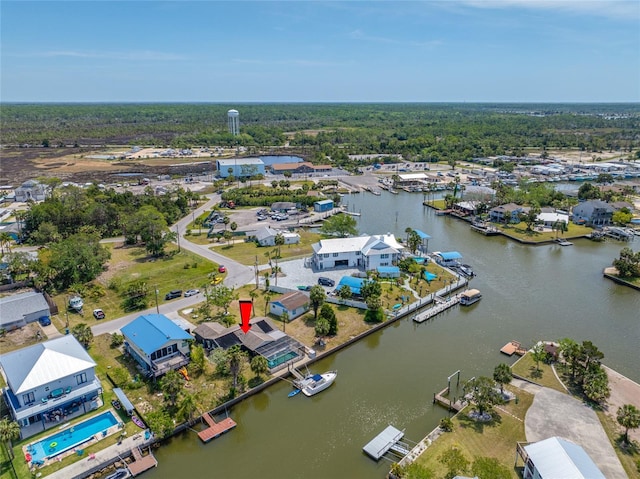 bird's eye view featuring a water view and a residential view