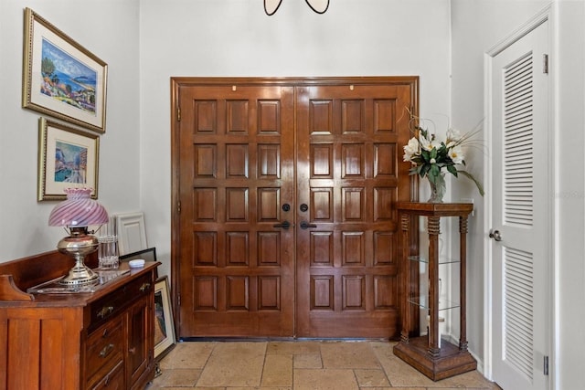 foyer with stone tile flooring