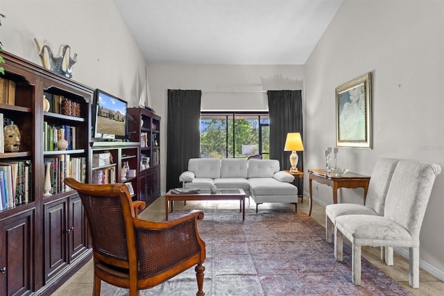sitting room featuring baseboards