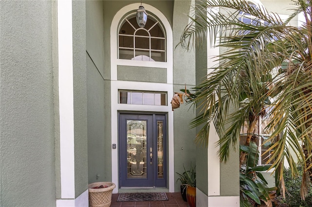 11102 Avery Oaks Dr, Tampa, FL 33625 - view of exterior entry with stucco siding