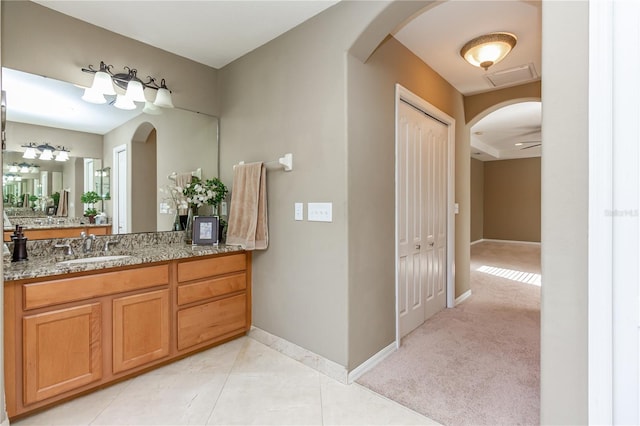 11102 Avery Oaks Dr, Tampa, FL 33625 - bathroom with visible vents, baseboards, and vanity
