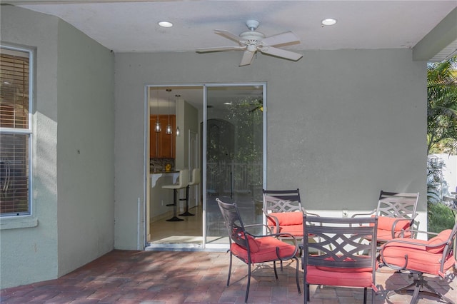 11102 Avery Oaks Dr, Tampa, FL 33625 - view of patio with ceiling fan and outdoor dining area