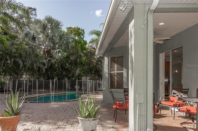 11102 Avery Oaks Dr, Tampa, FL 33625 - view of pool with fence, ceiling fan, a fenced in pool, and a patio