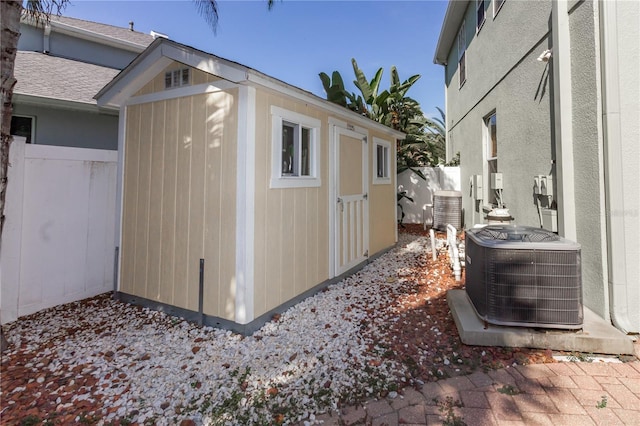11102 Avery Oaks Dr, Tampa, FL 33625 - view of shed with fence and cooling unit