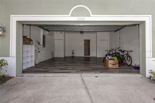 11102 Avery Oaks Dr, Tampa, FL 33625 - garage with a wall mounted AC