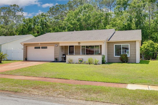 1144 Lanyard St, Palm Harbor, FL 34685 - single story home featuring driveway, a front lawn, roof with shingles, and a garage