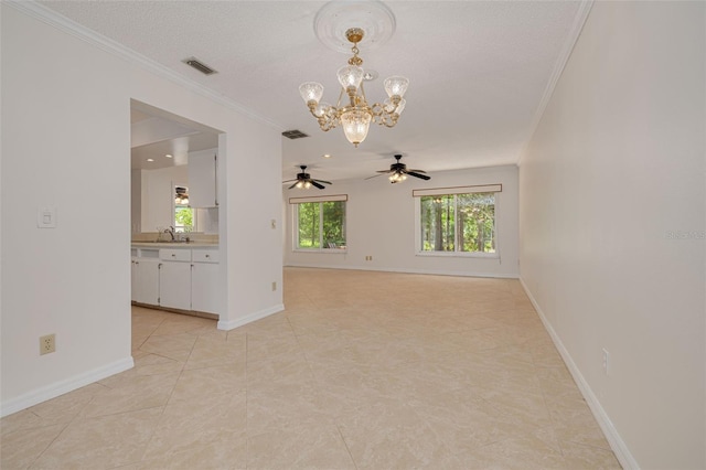 1144 Lanyard St, Palm Harbor, FL 34685 - unfurnished room with baseboards, ornamental molding, ceiling fan with notable chandelier, and visible vents