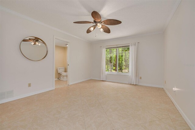 1144 Lanyard St, Palm Harbor, FL 34685 - unfurnished room with a textured ceiling, ceiling fan, ornamental molding, and light tile patterned flooring