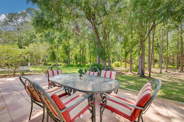 1144 Lanyard St, Palm Harbor, FL 34685 - view of patio / terrace featuring outdoor dining space