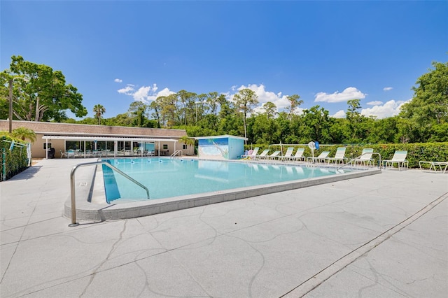 1144 Lanyard St, Palm Harbor, FL 34685 - community pool featuring a patio area